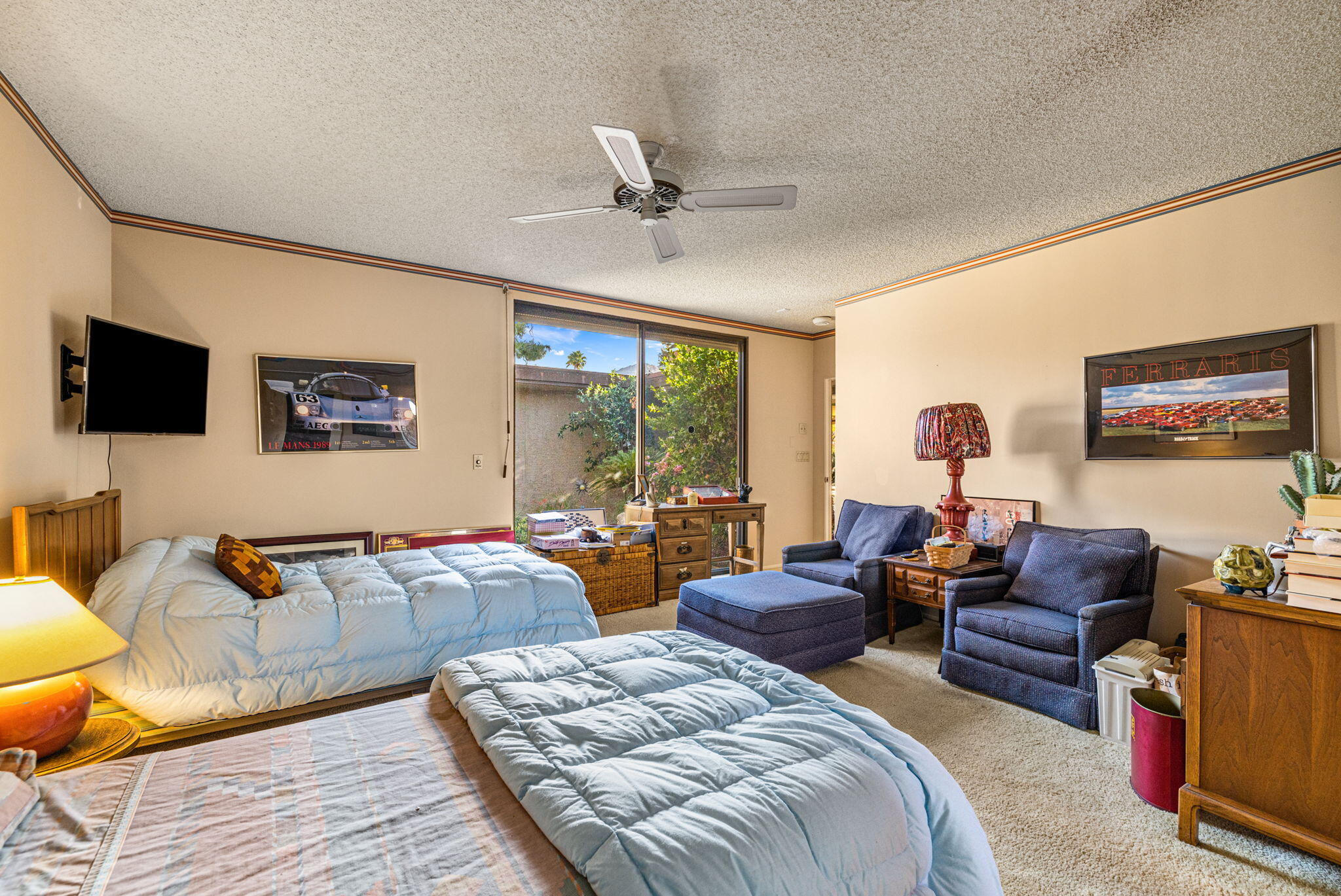 40675 East Thunderbird Terrace Rancho Mirage, CA 92270 - Photo 51 of 58 a spacious bedroom with two beds and a large window