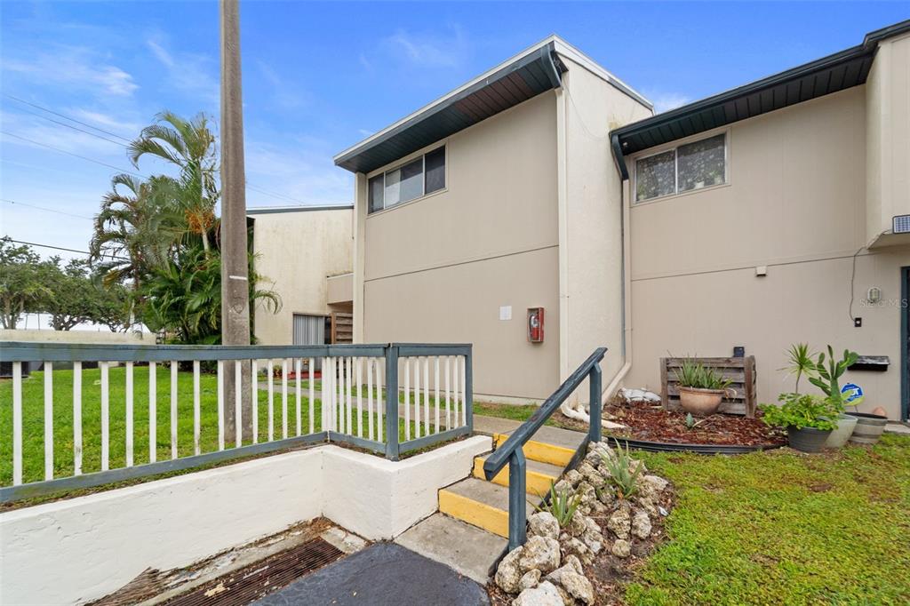 a view of a deck with a wooden fence