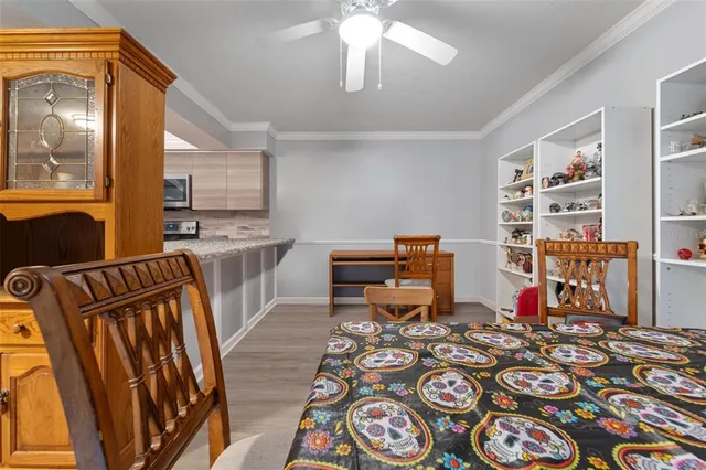 a very nice looking dining room with furniture