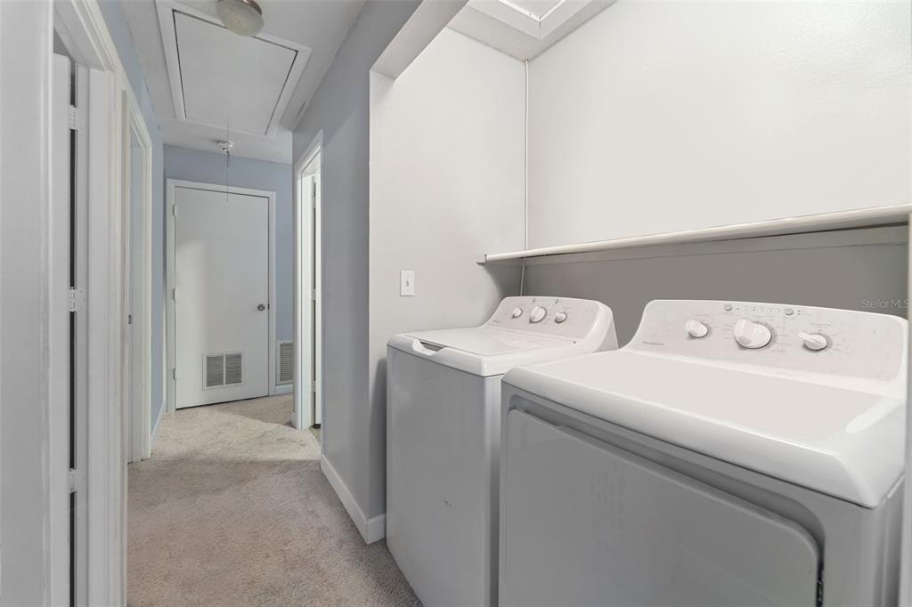 1112 Longfellow Road Sarasota, FL 34243 - Photo 25 of 48 a utility room with dryer and washer