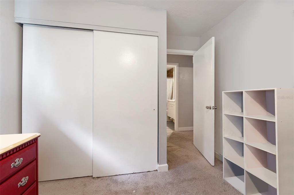 1112 Longfellow Road Sarasota, FL 34243 - Photo 39 of 48 a view of walk in closet with empty racks
