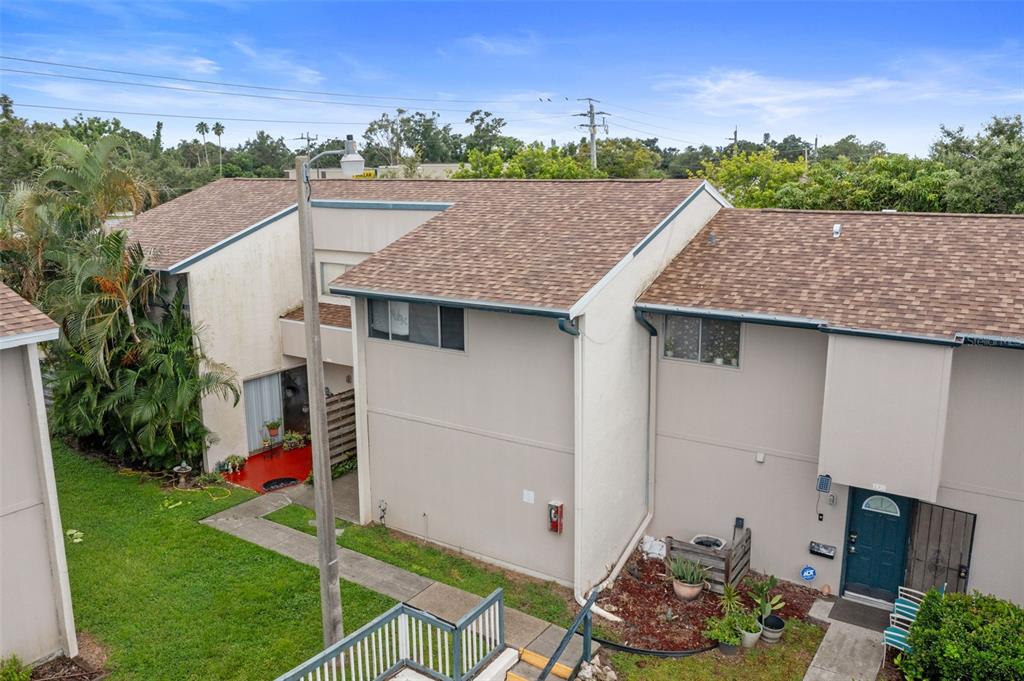 1112 Longfellow Road Sarasota, FL 34243 - Photo 45 of 48 a aerial view of a house with a yard and potted plants