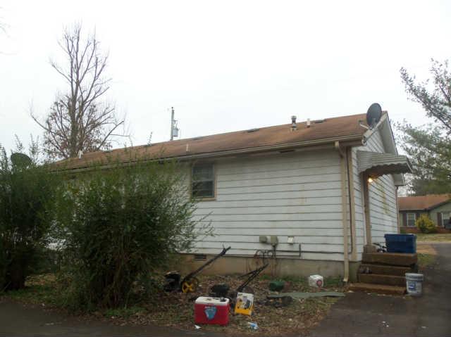 Park-like back yard with lots of potential