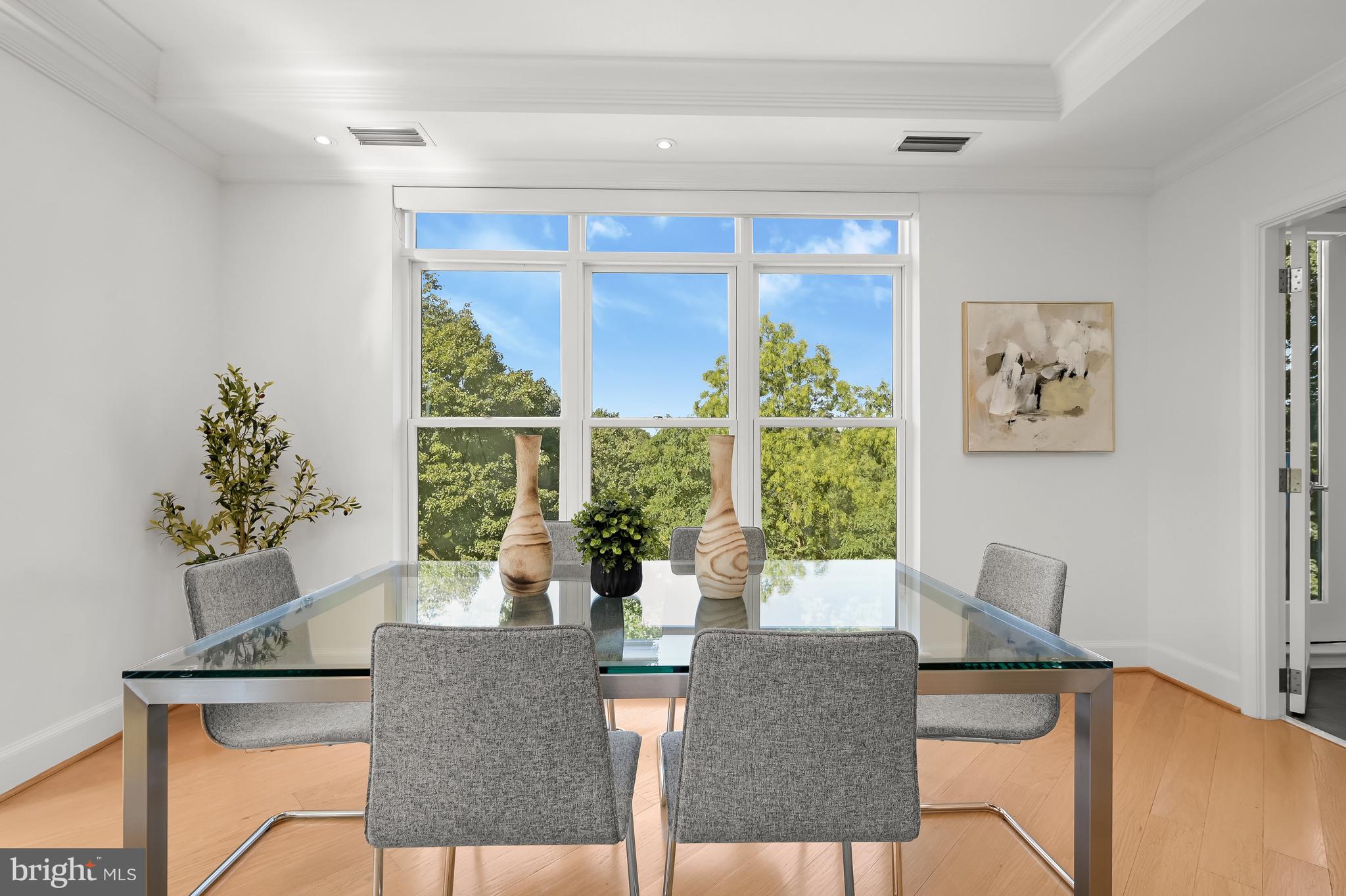 1414 22nd Street Northwest, Unit 41 Washington, DC 20037 - Photo 11 of 36 a living room with furniture and a large window