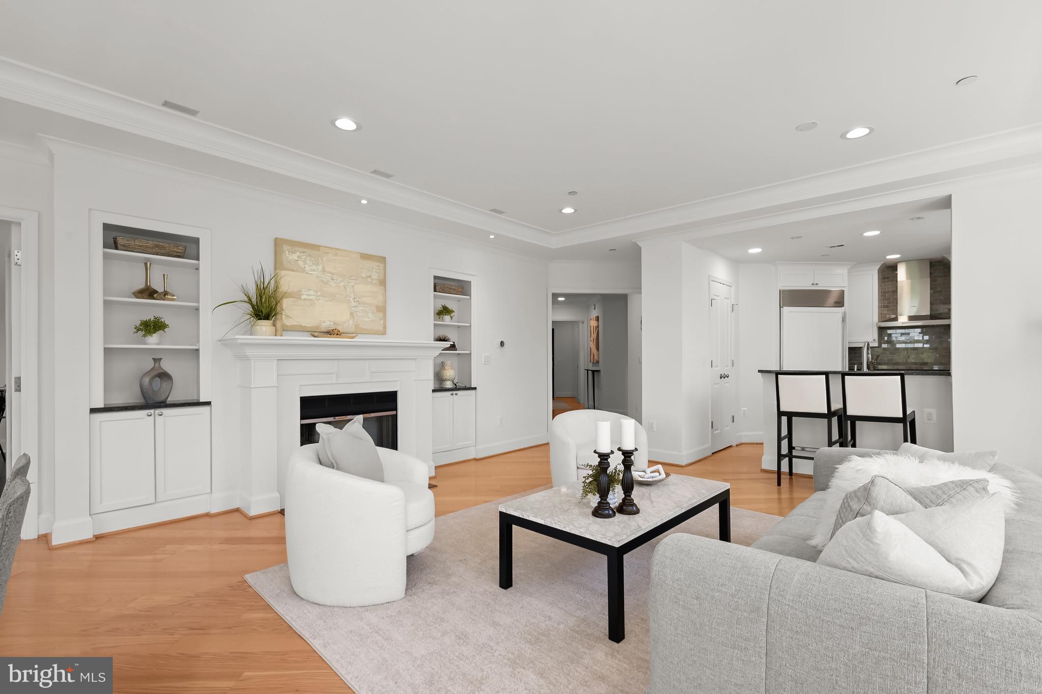 1414 22nd Street Northwest, Unit 41 Washington, DC 20037 - Photo 12 of 36 a living room with furniture and a fireplace