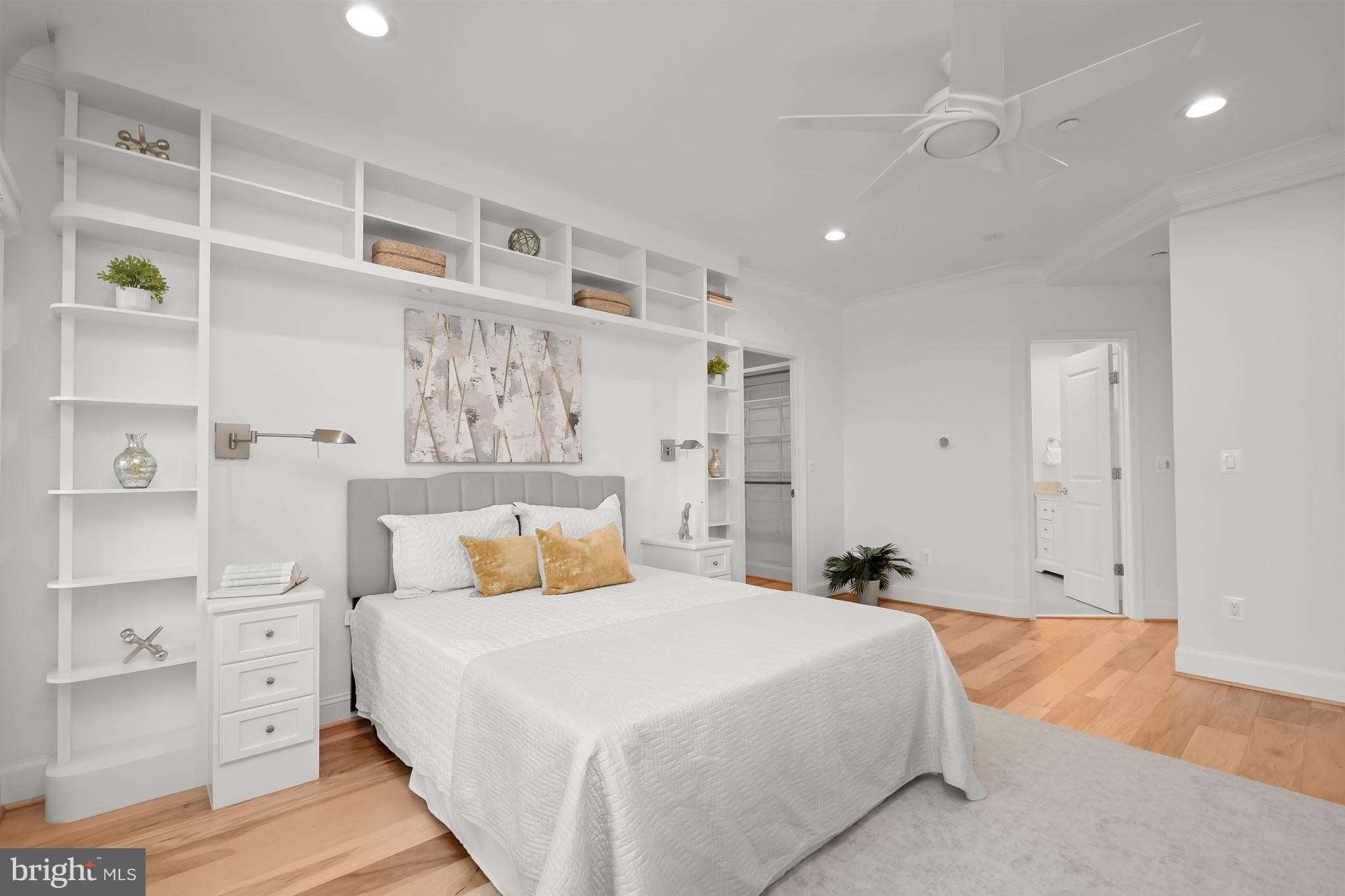 1414 22nd Street Northwest, Unit 41 Washington, DC 20037 - Photo 16 of 36 a bedroom with a bed and walk in closet