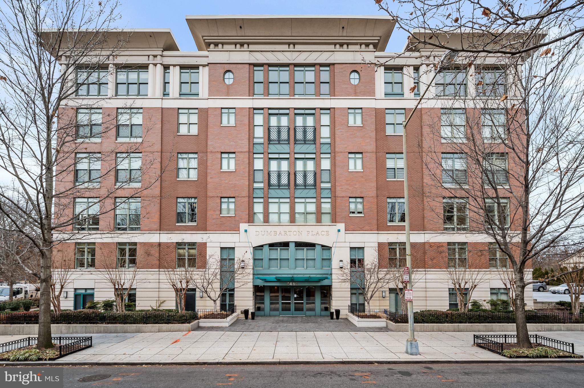 1414 22nd Street Northwest, Unit 41 Washington, DC 20037 - Photo 2 of 36 a front view of a building with a street