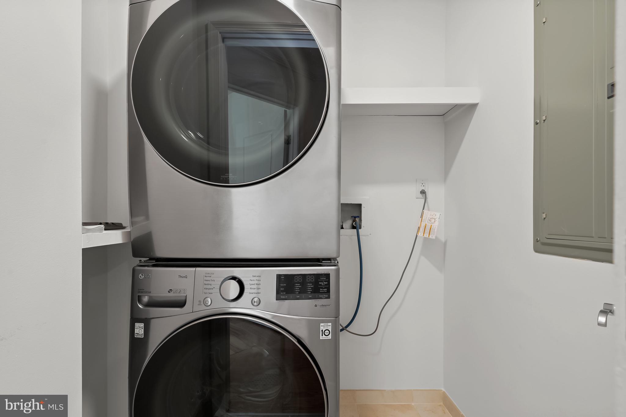 1414 22nd Street Northwest, Unit 41 Washington, DC 20037 - Photo 25 of 36 a close up view of a washer and dryer