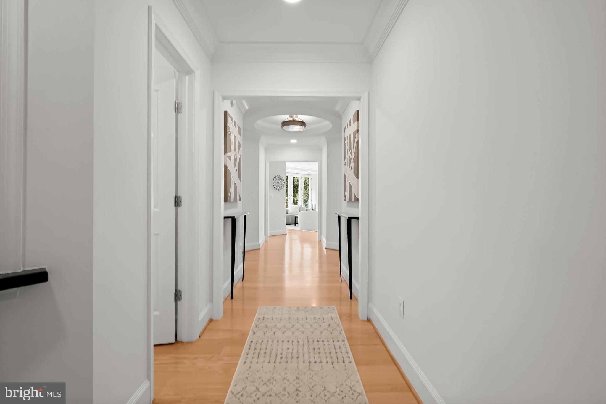 1414 22nd Street Northwest, Unit 41 Washington, DC 20037 - Photo 7 of 36 a view of a hallway with a glass door
