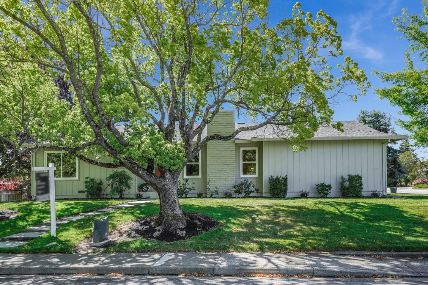 184 Temelec Circle Sonoma, CA 95476 - Photo 13 of 42 a front view of a house with a garden