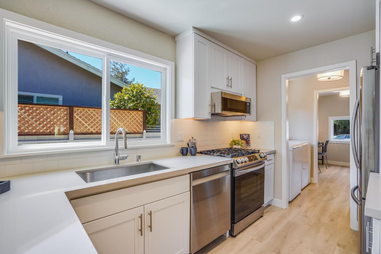 184 Temelec Circle Sonoma, CA 95476 - Photo 19 of 42 a kitchen with a sink stove and microwave