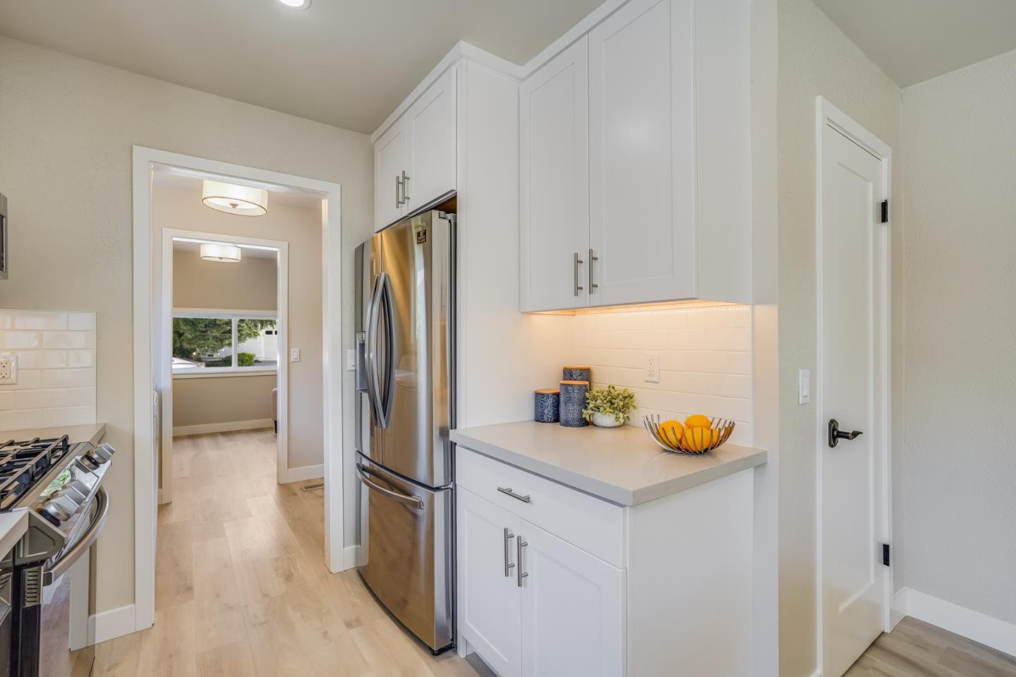 184 Temelec Circle Sonoma, CA 95476 - Photo 20 of 42 a view of a kitchen with a sink a refrigerator and stove