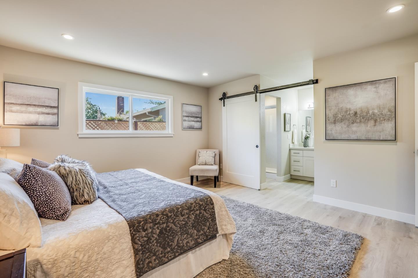 184 Temelec Circle Sonoma, CA 95476 - Photo 21 of 42 a bedroom with a large bed and a rug