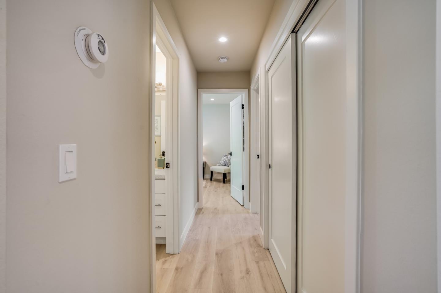 184 Temelec Circle Sonoma, CA 95476 - Photo 24 of 42 a view of a hallway with wooden floor