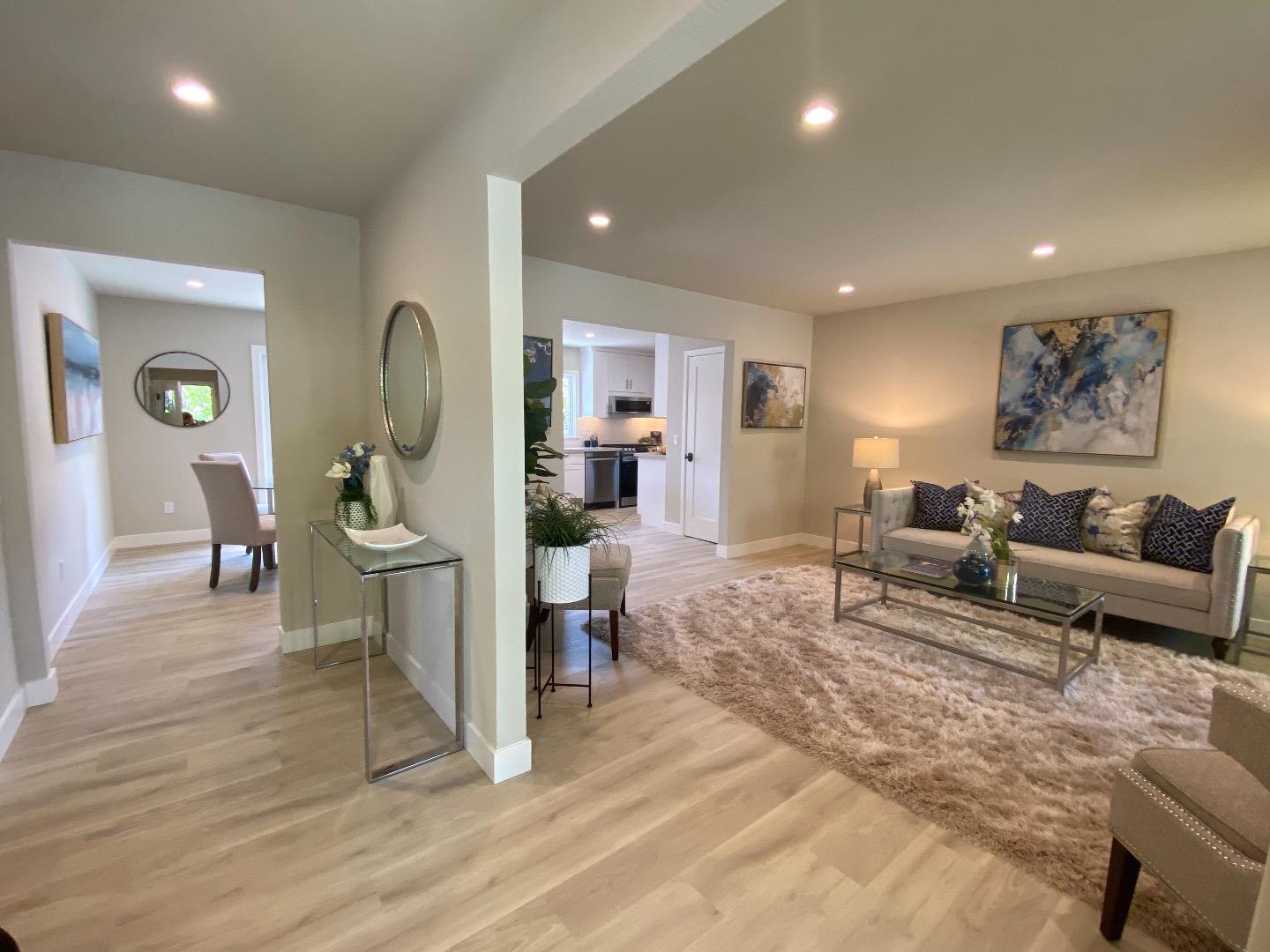 184 Temelec Circle Sonoma, CA 95476 - Photo 8 of 42 a living room with furniture and a wooden floor
