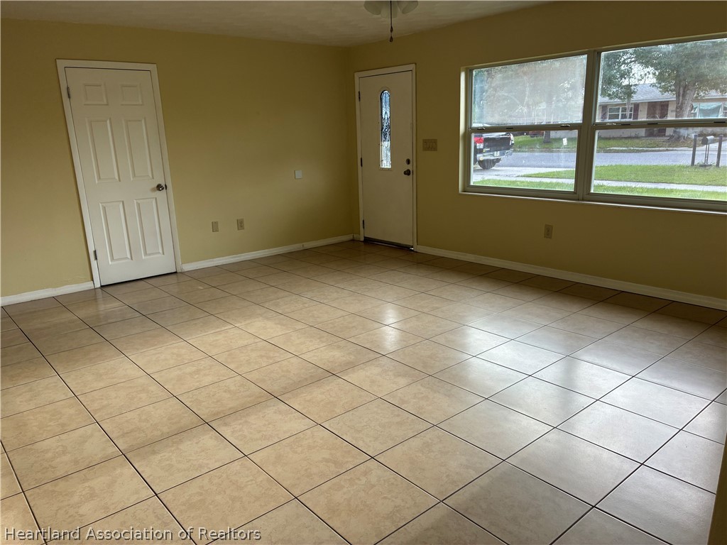1525 Lagrange Avenue Sebring, FL 33870 - Photo 3 of 16 a view of an empty room and a window