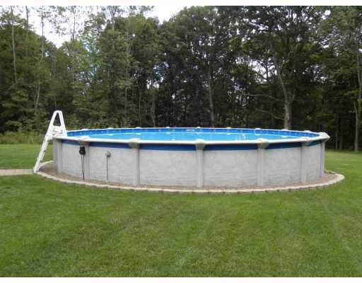 925 Logan Road Tarentum, PA 15084 - Photo 14 of 18 Swimming Pool/Hot Tub/Sauna. POOL/ REAR YARD FROM SLIDING GLASS DOORS.