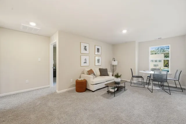 a workspace with furniture and window