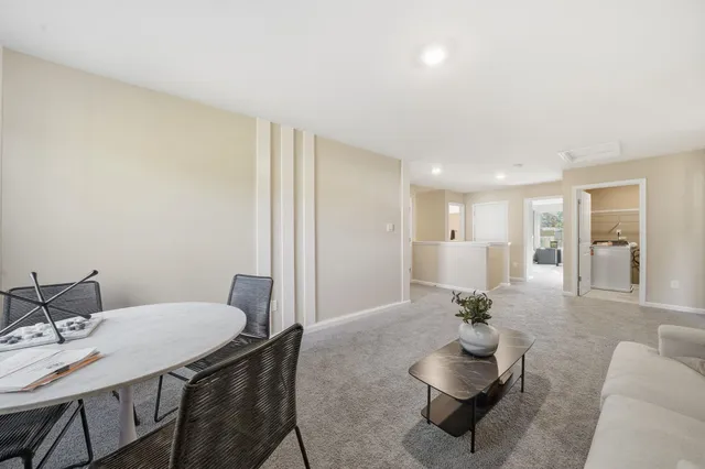 a bedroom with a bed and dresser