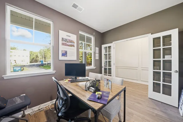 a bathroom with a double vanity sink a mirror and a