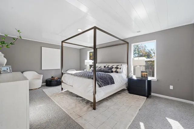 a living room with furniture and a couch