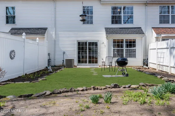 a backyard of a house with seating space