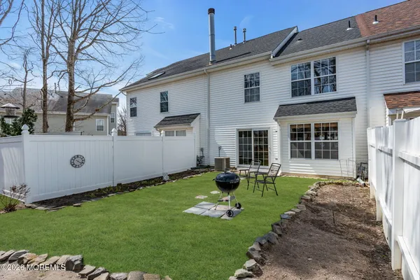 a house view with a garden space