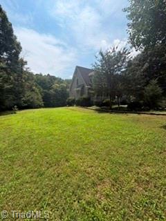 7620 Grapevine Road Lewisville, NC 27023 - Photo 40 of 49 Side View of Yard