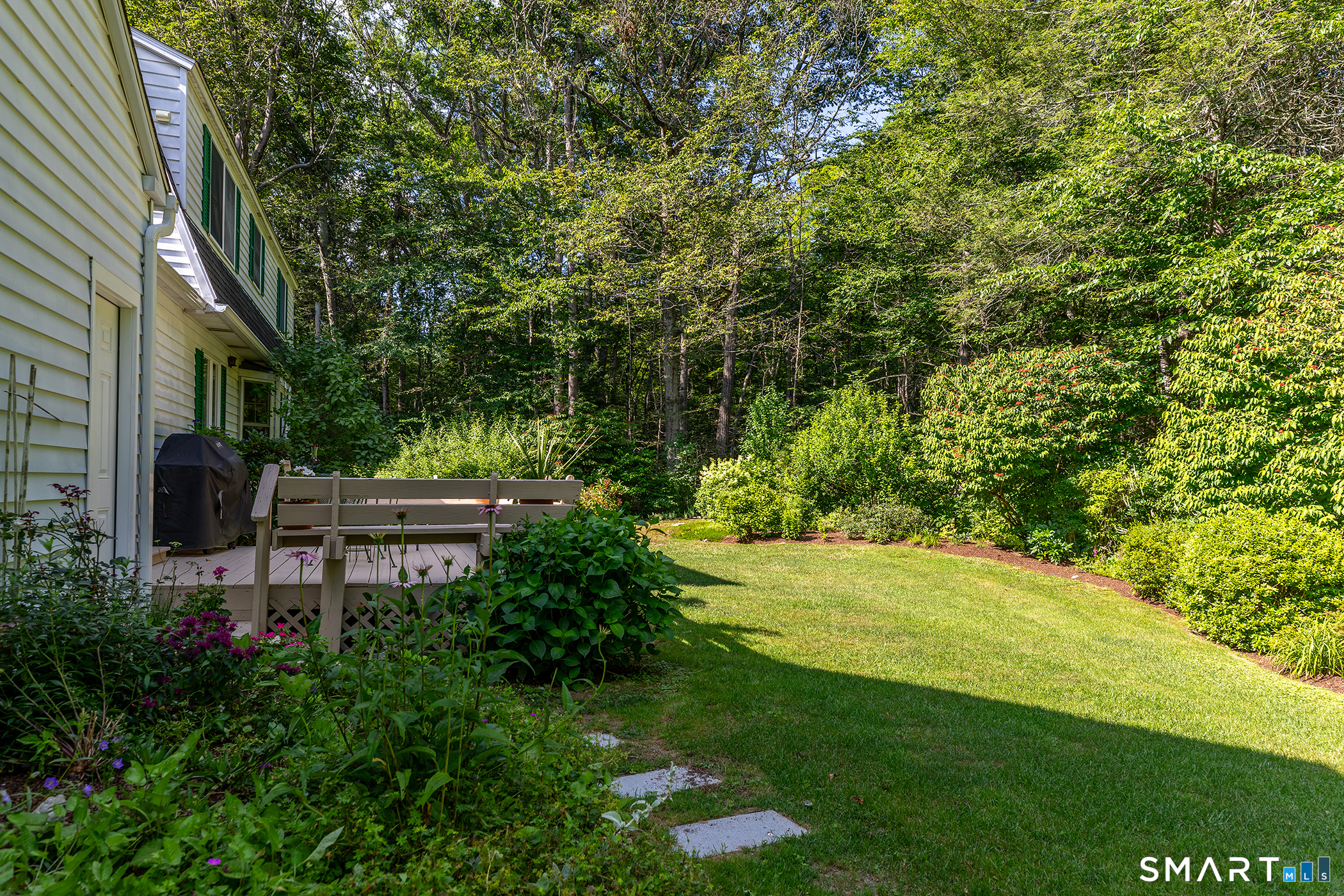 318 Romford Road Washington, CT 06777 - Photo 6 of 34 a view of a backyard with sitting area
