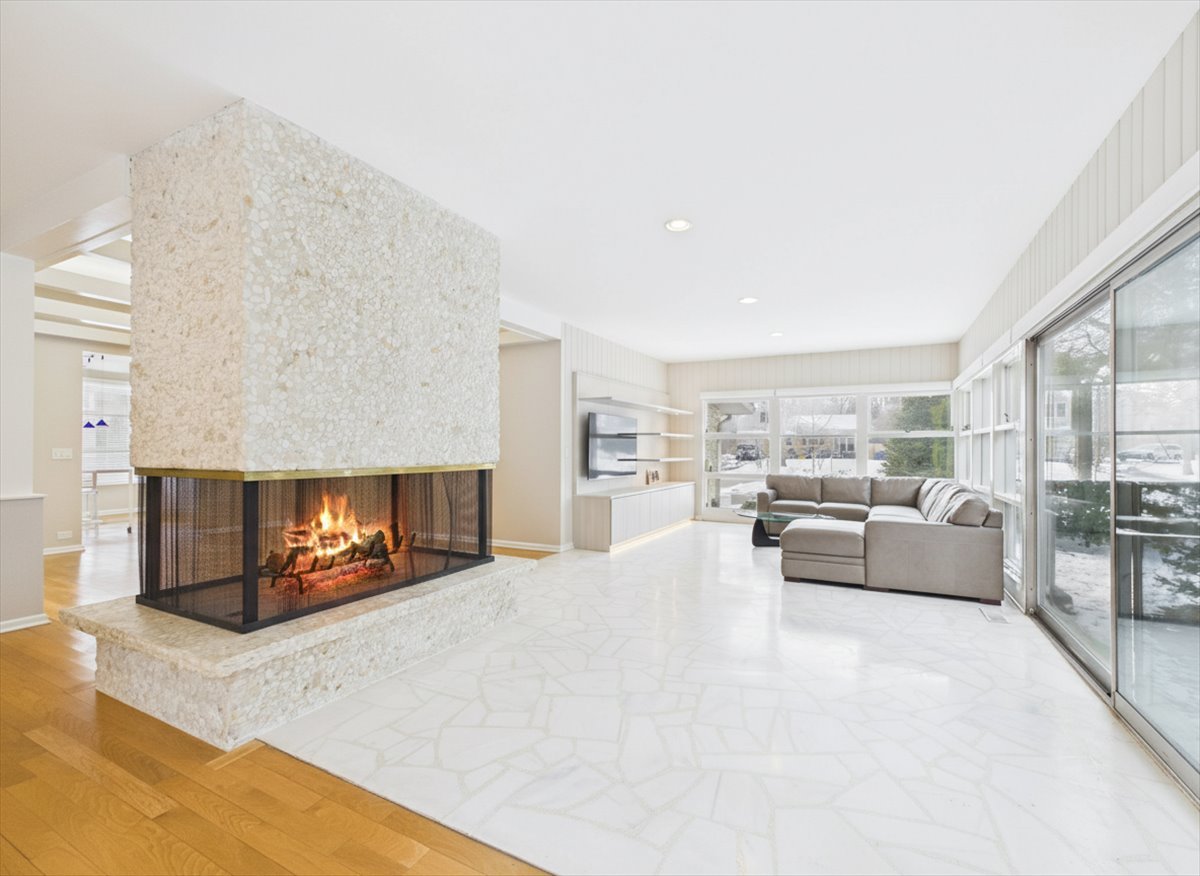 730 Sheridan Road Highland Park, IL 60035 - Photo 10 of 48 a living room with furniture and a fireplace