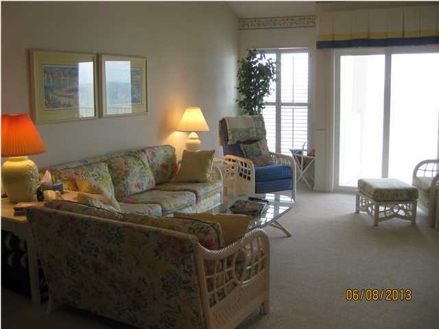 6015 Highway Santa Rosa Beach, Unit A303 30A Santa Rosa Beach, FL 32459 - Photo 3 of 12 a living room with furniture and a large window