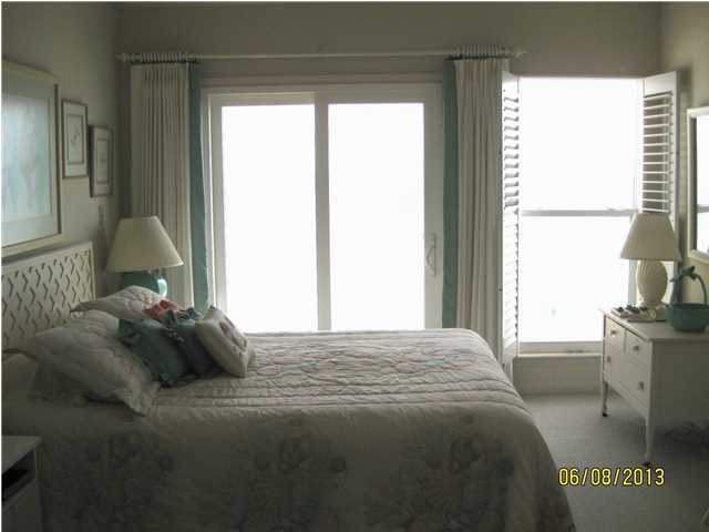 6015 Highway Santa Rosa Beach, Unit A303 30A Santa Rosa Beach, FL 32459 - Photo 4 of 12 a bedroom with a bed and a window