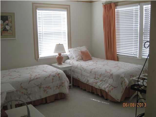 6015 Highway Santa Rosa Beach, Unit A303 30A Santa Rosa Beach, FL 32459 - Photo 8 of 12 a bedroom with two beds and a window