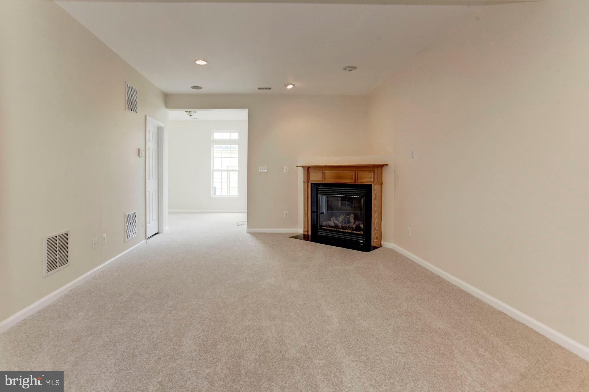 16618 Barge Circle Woodbridge, VA 22191 - Photo 12 of 65 Rec room with new carpet and sun room ext.