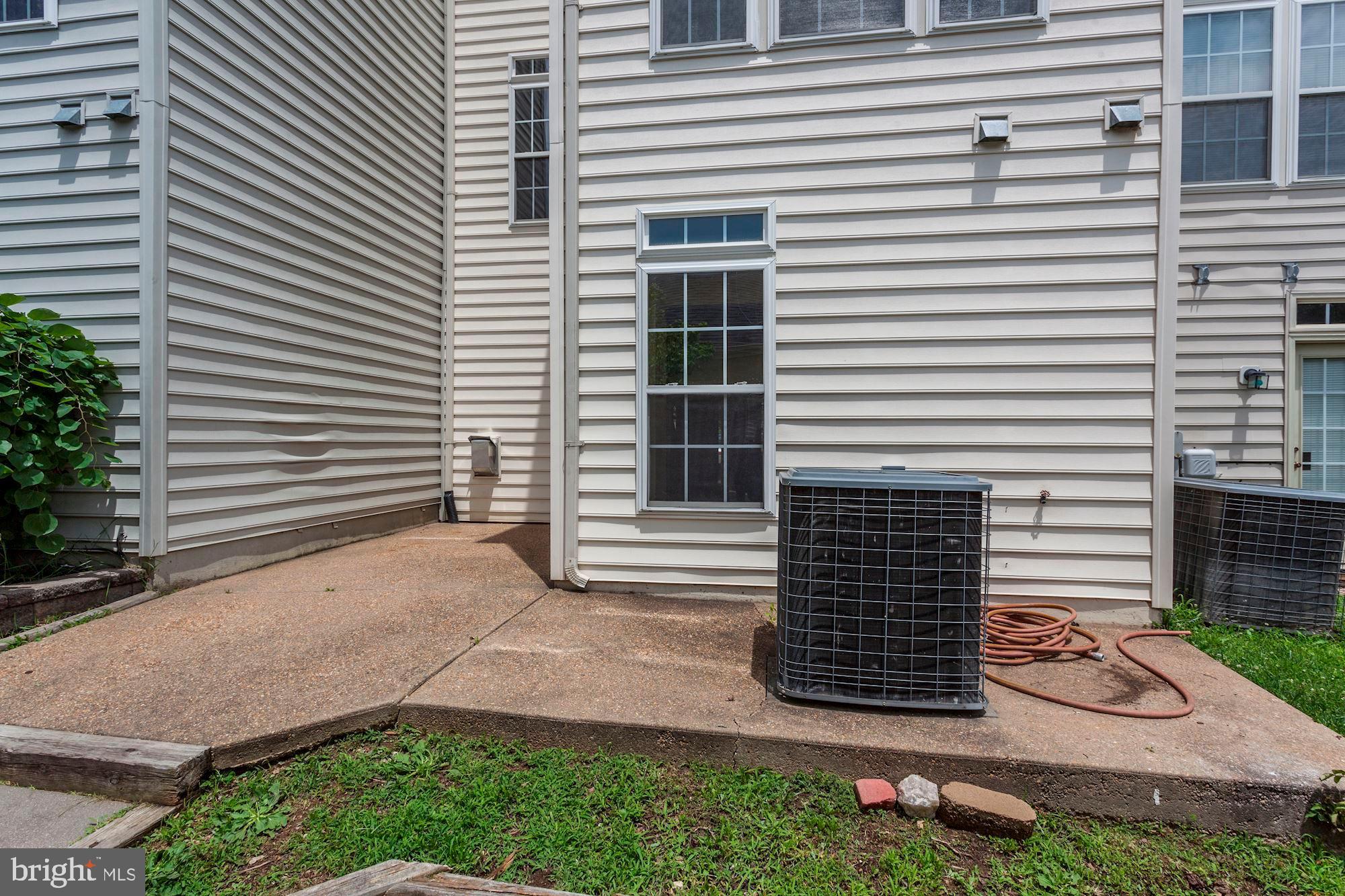 16618 Barge Circle Woodbridge, VA 22191 - Photo 58 of 65 Patio with walkway to the double garage