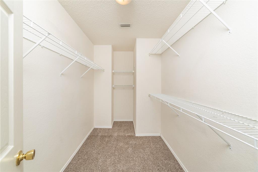 4408 Statesman Lane Fort Worth, TX 76244 - Photo 24 of 40 Spacious closet featuring carpet flooring