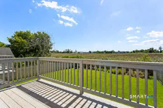 a view of a wooden roof deck
