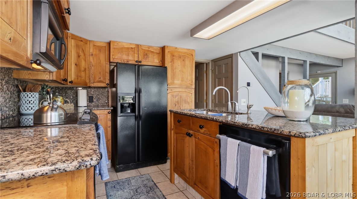 1069 Indian Hill Road Sunrise Beach, MO 65079 - Photo 9 of 54 Kitchen w/ Granite Counters