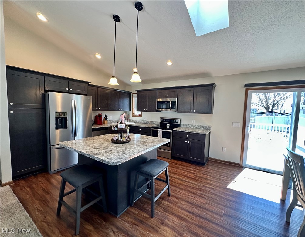 1039 Susan Road Ravenna, OH 44266 - Photo 7 of 25 LARGE KITCHEN WITH BREAKFAST BAR.
