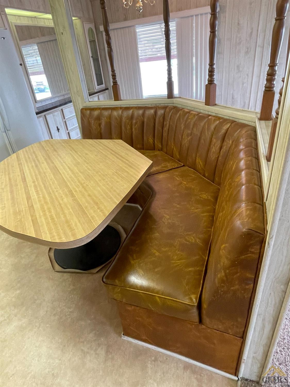 Undisclosed Address Bakersfield, CA 93308 - Photo 21 of 40 a bed sitting in a bedroom next to a window