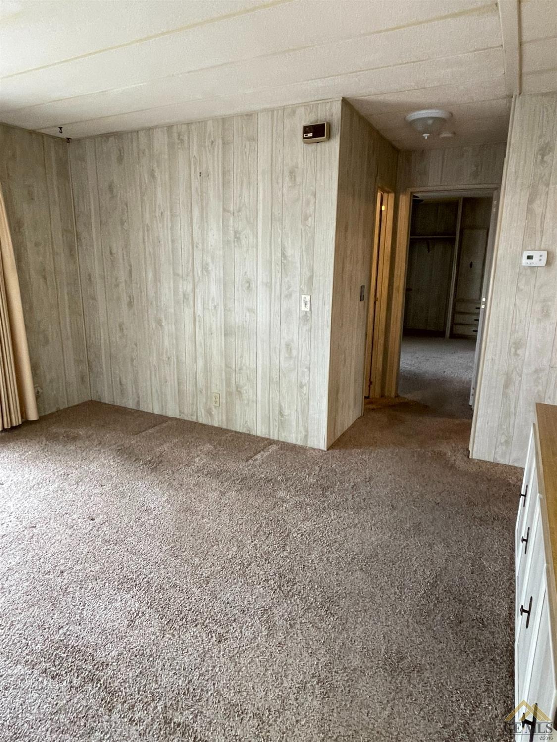 Undisclosed Address Bakersfield, CA 93308 - Photo 24 of 40 a view of an empty room and a window