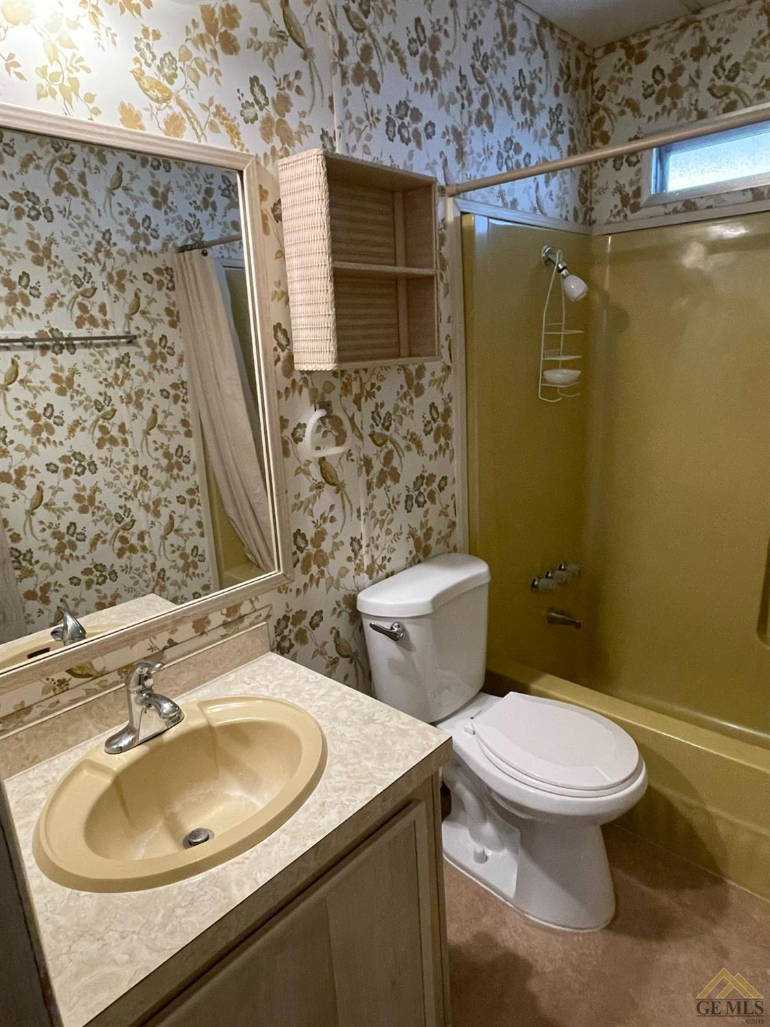Undisclosed Address Bakersfield, CA 93308 - Photo 25 of 40 a bathroom with a sink and a toilet