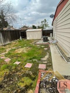 Undisclosed Address Bakersfield, CA 93308 - Photo 40 of 40 a front view of a house with a yard