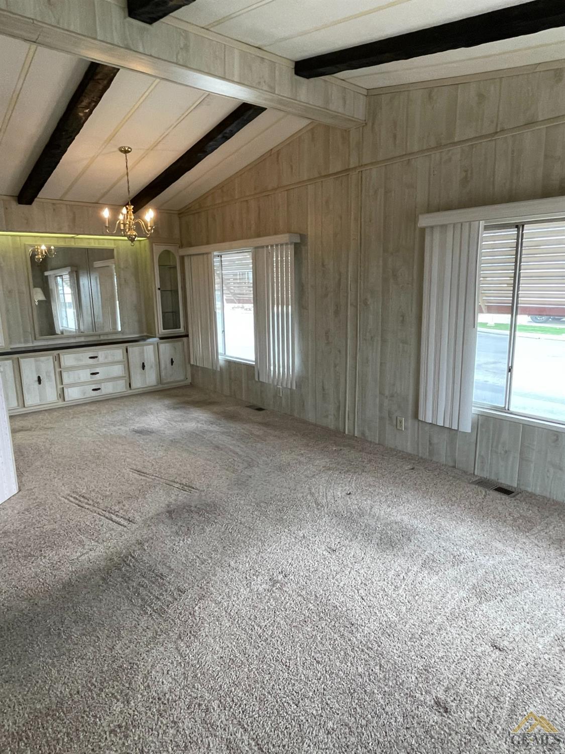 Undisclosed Address Bakersfield, CA 93308 - Photo 7 of 40 a view of an empty room with windows