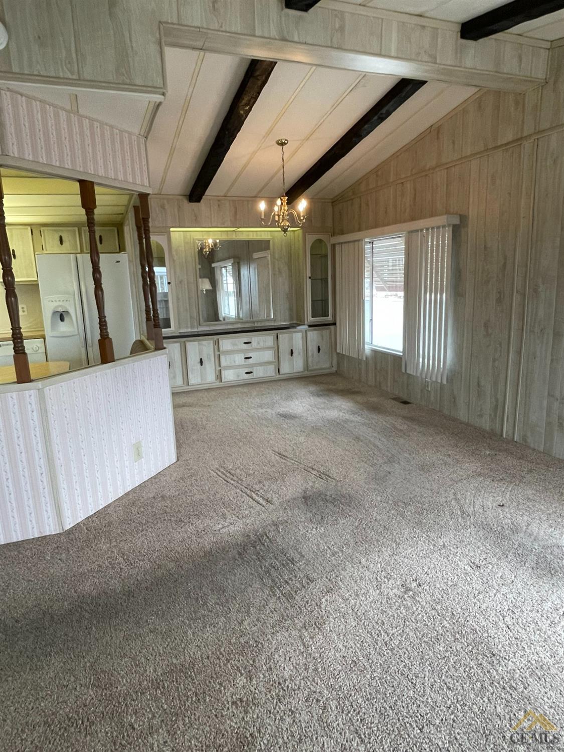 Undisclosed Address Bakersfield, CA 93308 - Photo 8 of 40 a view of a livingroom with furniture and a window