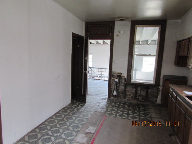 1915 South Pulaski Road Chicago, IL 60623 - Photo 14 of 14 a bathroom with a bathtub and a shower