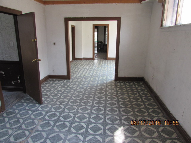 1915 South Pulaski Road Chicago, IL 60623 - Photo 8 of 14 en empty room with window