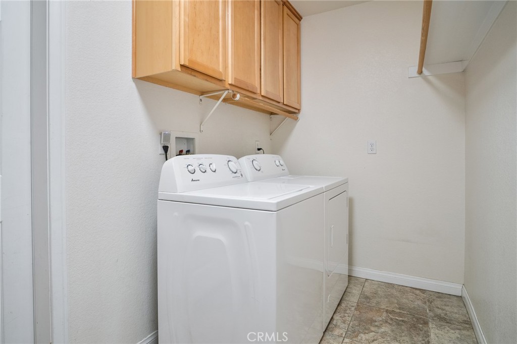 388 Calaveras Road Pinon Hills, CA 92372 - Photo 23 of 44 a utility room with dryer and washer