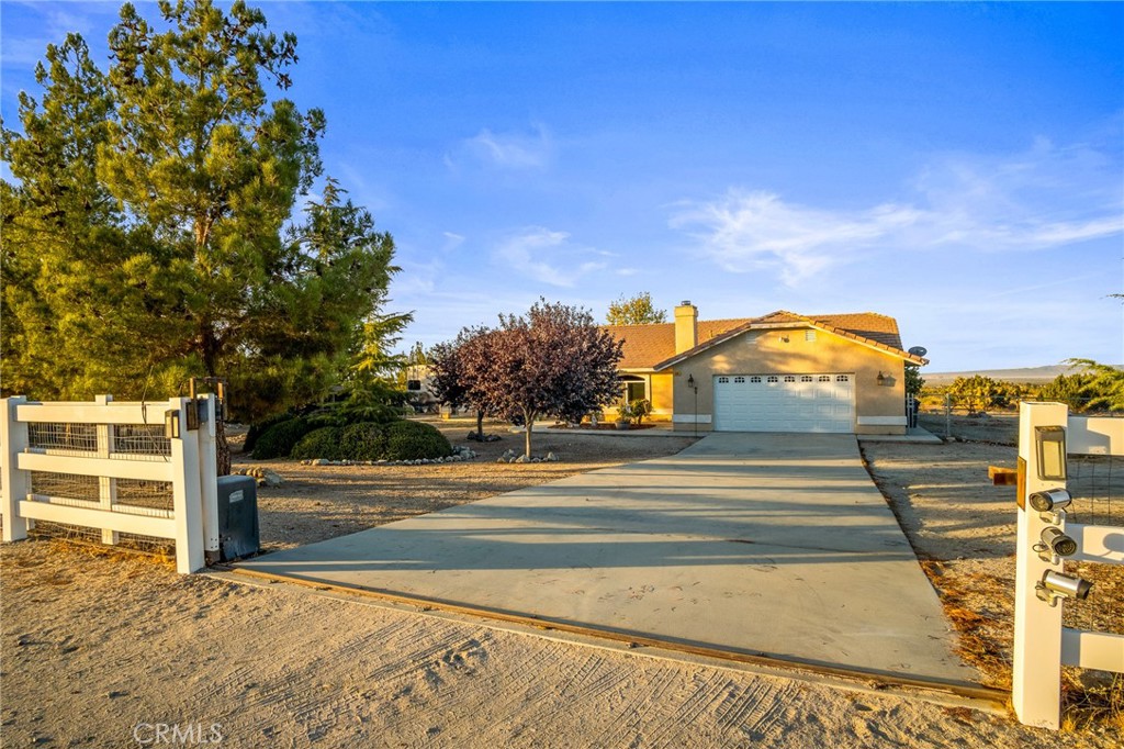 388 Calaveras Road Pinon Hills, CA 92372 - Photo 25 of 44 a view of a swimming pool with an outdoor space and seating area
