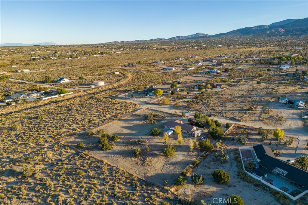388 Calaveras Road Pinon Hills, CA 92372 - Photo 37 of 44 an aerial view of residential building and parking space
